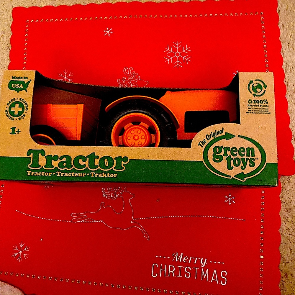 Big bright red fire truck . Manufactured by Green Toys